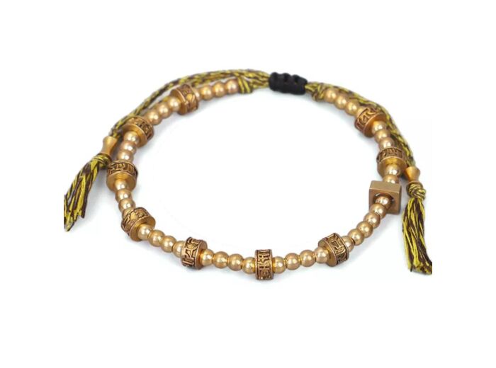 Bracelet tibétain corde perles et moulin a prière Ohm