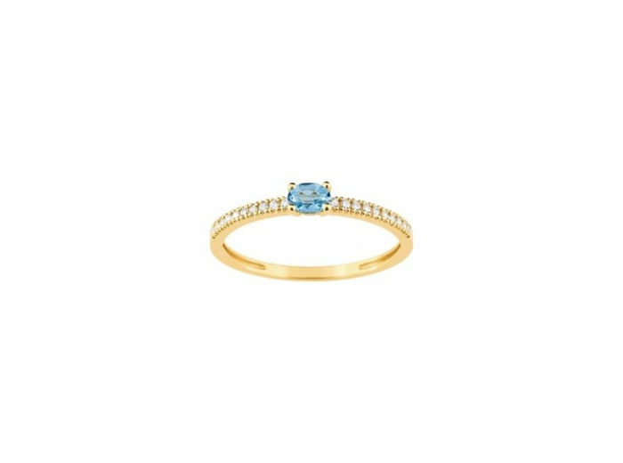 Bague en or jaune et topaze bleue