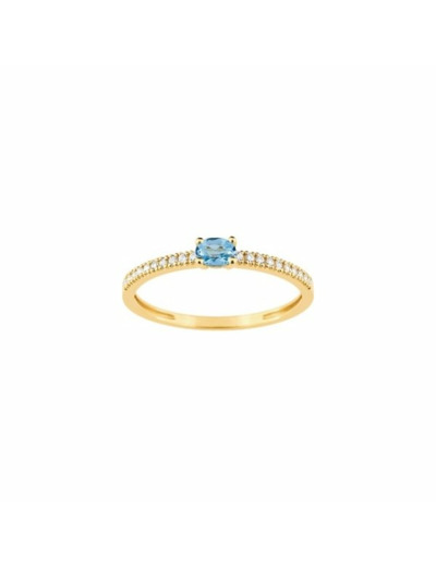 Bague en or jaune et topaze bleue